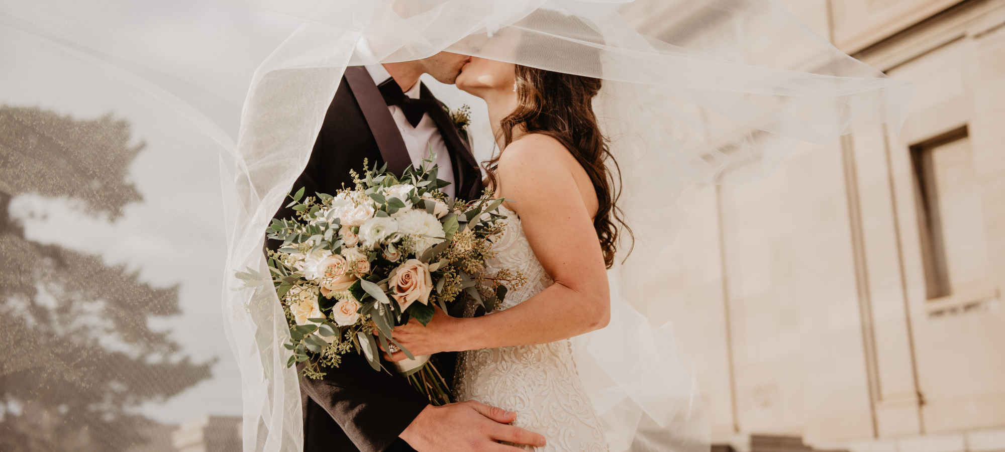 bride and groom kissing 